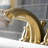 Kingston Brass Restoration Two-Handle 3-Hole Deck Mount Mini-Widespread Bathroom Faucet with Plastic Pop-Up-69607366