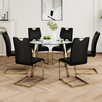 Table de salle à manger ronde moderne en verre transparent avec pieds en métal galvanisé et chaise en polyuréthane noire pour la maison