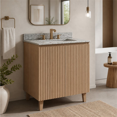 Meuble-lavabo autoportant avec comptoir en granit naturel et lavabo en céramique pour des solutions de rangement modernes
