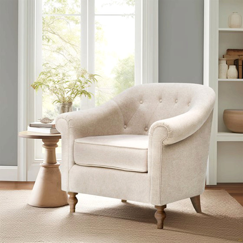 Fauteuil capitonné
