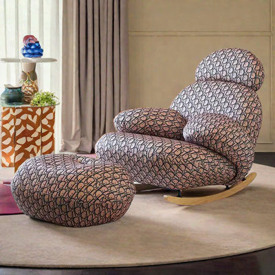 Chaise berçante en tissu rétro