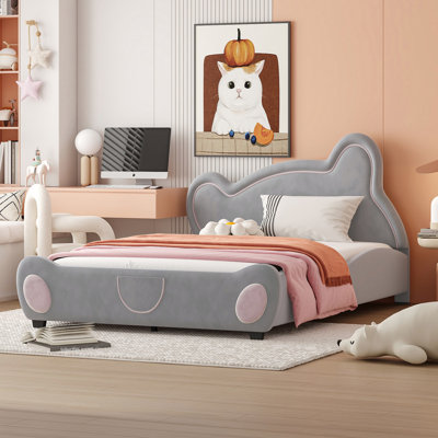 Adorable lit plateforme double avec tête de lit en forme d'ours, offrant confort, sécurité et rangement pour une chambre de rêve