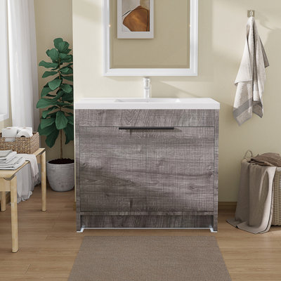 Meuble-lavabo autoportant avec portes à fermeture en douceur et lavabo en céramique