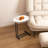 C-shaped side table in white, modern wood top with metal frame design for sofa and bedside placement-114039279
