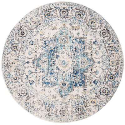 Christa Oriental Turquoise/Ivory Area Rug