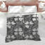 Édredon noir à motif floral-133733670