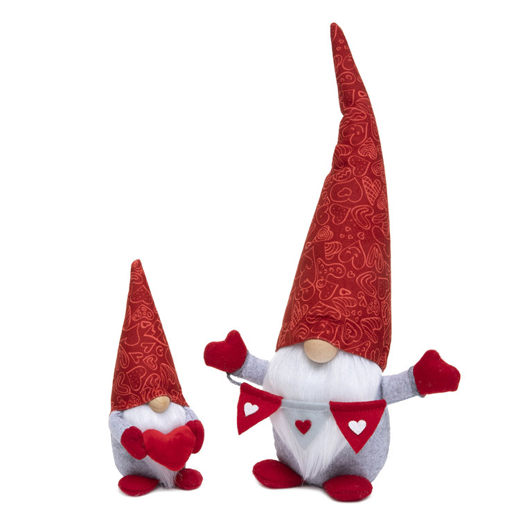 https://assets.wfcdn.com/im/72471635/resize-h755-w755%5Ecompr-r85/2407/240746708/GNOME+RED%2FGREY+HOLDING+PLUSH+HEART+2.75%22X3.75%22X7%22.jpg