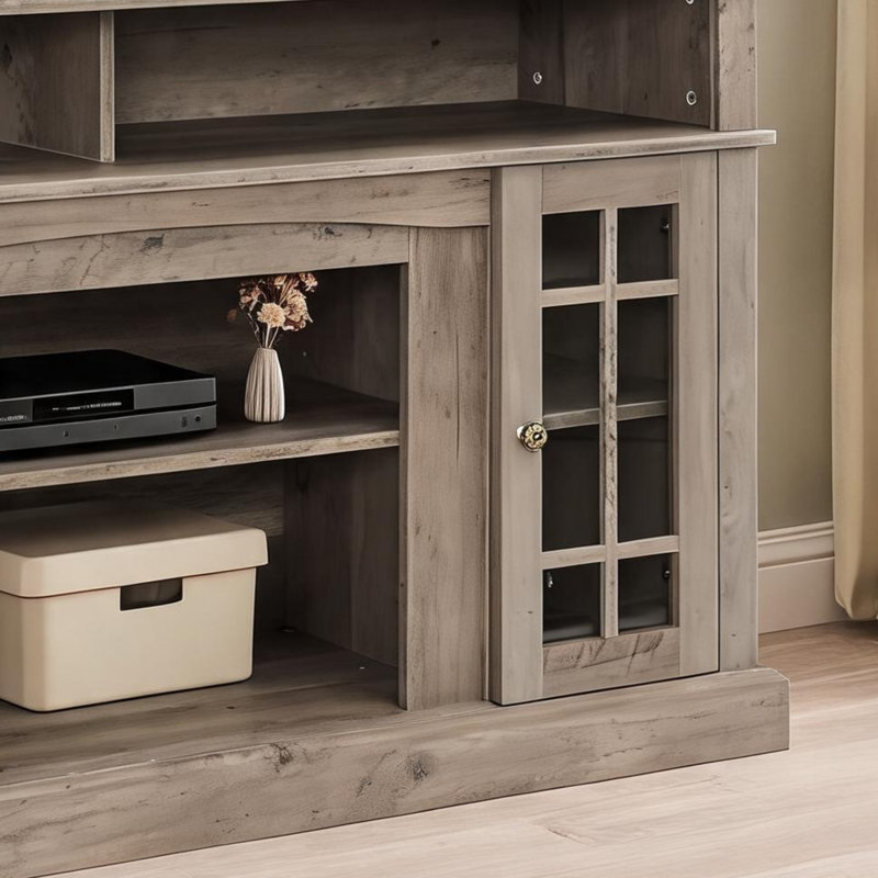 La console de divertissement grise peut accueillir un téléviseur de 65 pouces avec rangement combiné