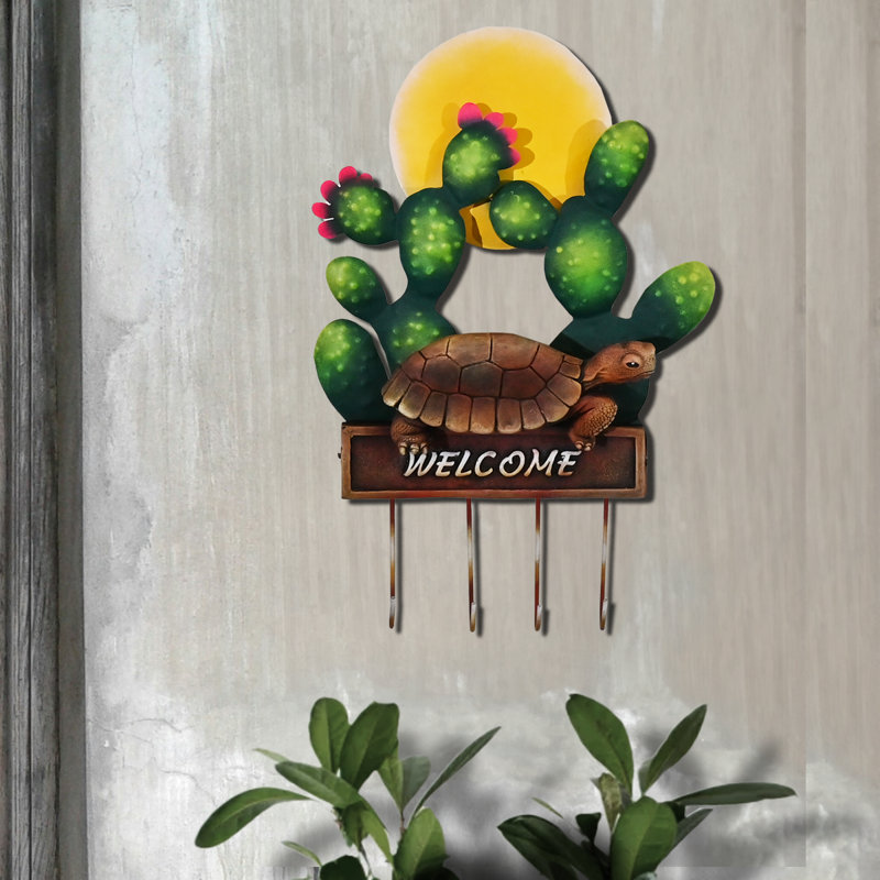 Porte-affiche 3D "Welcome" en acier et fibre de verre encadré de figuier de barbarie et de tortue du désert