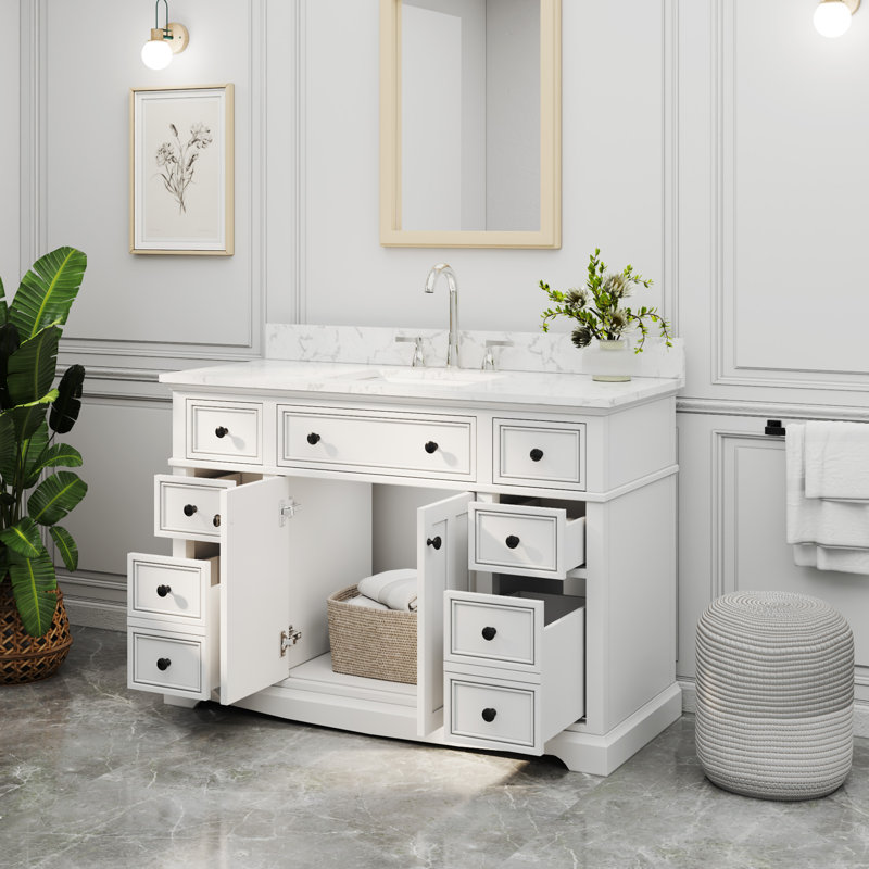 Meuble-lavabo simple Barnhart 48 po entièrement assemblé avec comptoir en pierre reconstituée, lavabo en céramique, peinture à la main, tiroirs à fermeture amortie sous le meuble et charnières de porte à fermeture amortie, dosseret inclus