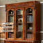 Bibliothèque de rangement en bois de frêne massif à trois portes avec panneaux de verre