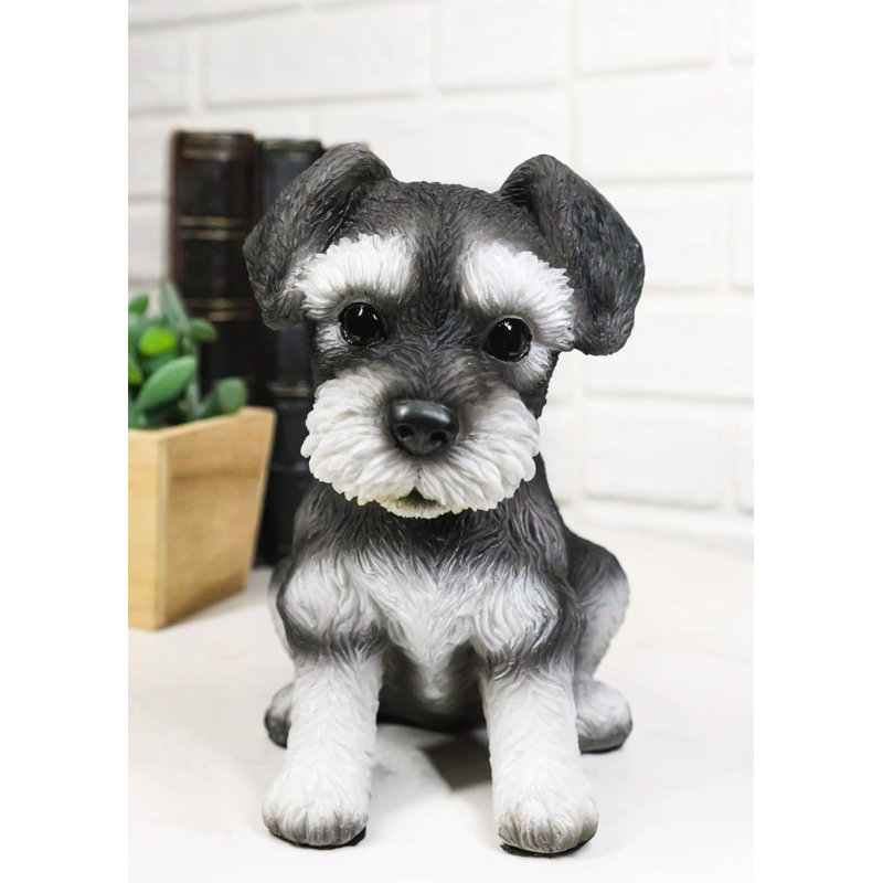 Adorable figurine de chiot miniature Schnauzer