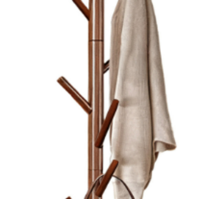 Ce portemanteau sur pied simple en bois massif est robuste, durable et esthétique. Il permet un rangement facile des vêtements et des sacs et est une pièce polyvalente et intemporelle pour n'importe quelle pièce.