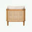 Fauteuil d'extérieur en osier avec coussin moelleux