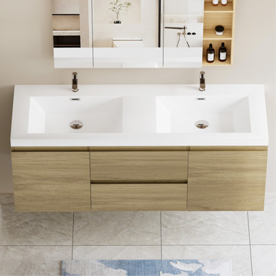 Meuble-lavabo flottant avec double vasque, mural et peu encombrant, pour une salle de bain moderne et fonctionnelle.