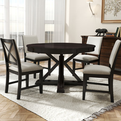 Round And Oval Extendable Dining Table