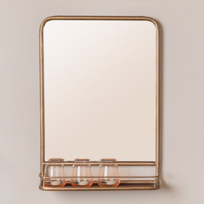 Miroir mural en métal avec tablette