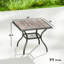 Table de patio carrée durable avec rangement, structure en acier noir, pour les repas en famille