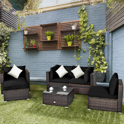Patiojoy 7 Piece Rattan Sectional Seating Group with Cushions