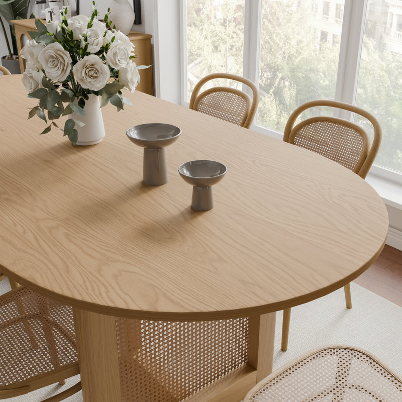 Ensemble de table et de chaises de salle à manger ovales de 170 cm (67 po) avec des chaises rembourrées, en rotin, avec double piétement pour 2 à 6 personnes.
