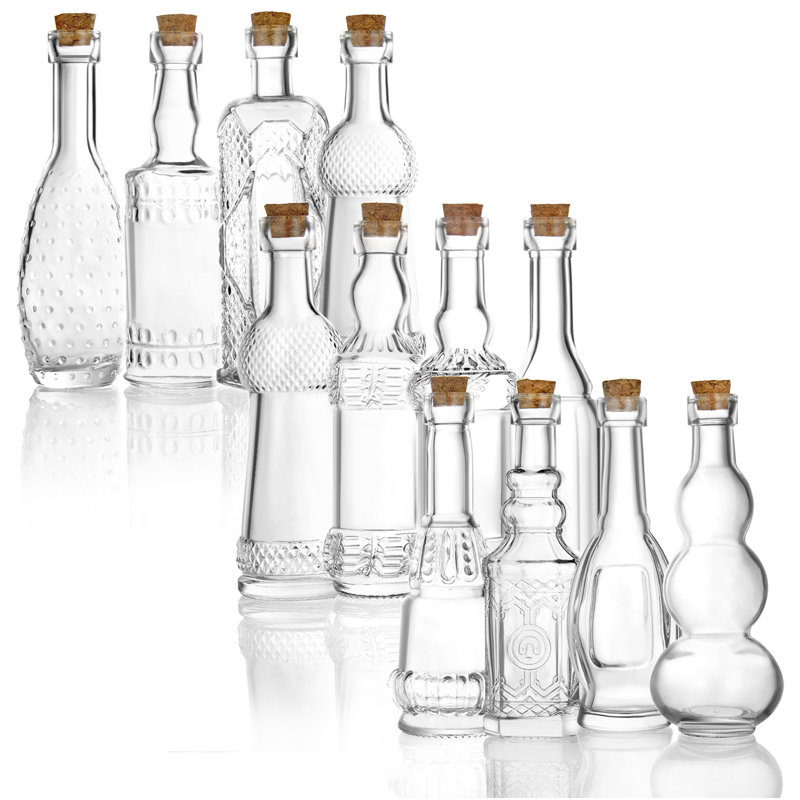 Ensemble de 12 bouteilles décoratives en verre