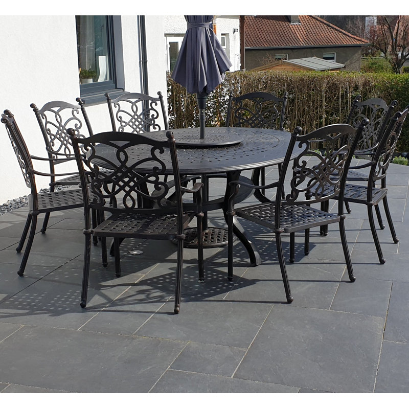 Canouan 8 - Person Patio Dining Set with Oval Table , Cushions Included