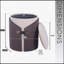 Repose-pieds élégant à deux tons avec rangement caché et accents dorés, parfait pour le meuble-lavabo ou le salon