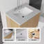 Meuble-lavabo suspendu avec lavabo, porte à fermeture douce et comptoir en marbre reconstitué-425256384