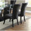 Chaises de salle à manger rembourrées 2 pièces en polyuréthane noir, conception moderne avec siège rembourré, fabrication en bois d'hévéa de 2 sièges décoratifs en similicuir, base