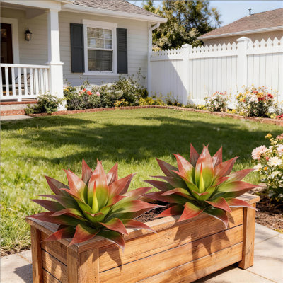 Plante grasse artificielle insérée au sol
