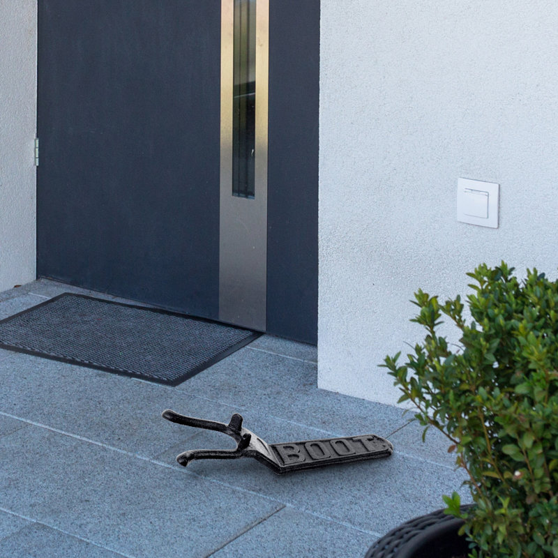 Accessoire de racloir pour chaussures en fonte