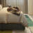 The Large Fabric Platform Bed Is Equipped With A Large Bedside Board. As The Highlight Of The Bedroom Furniture, It Uses A Grey Velvet Fabric To Highlight The Low -key Luxury.