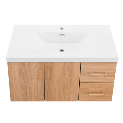 Meuble-lavabo suspendu de 91 cm (36 pouces) avec poignées dorées élégantes, grand espace de rangement, fermeture silencieuse, matériau de qualité et lavabo en résine blanche. Meubles modernes avec rails silencieux, bonne résistance et nettoyage facile.