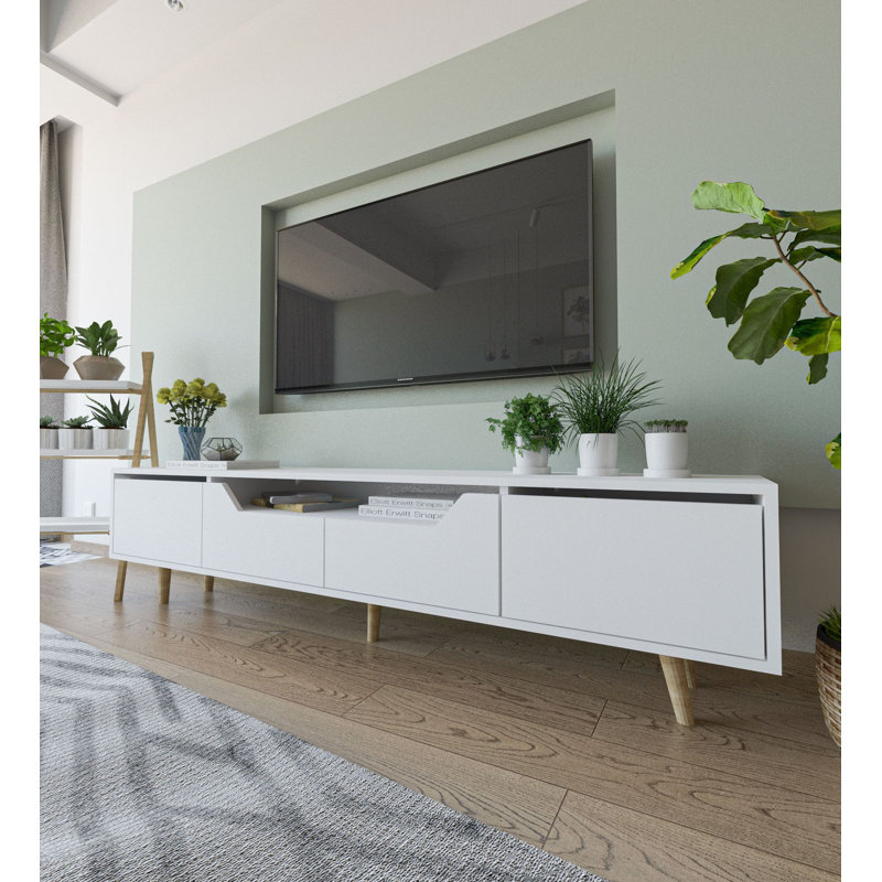 Meuble télé moderne blanc avec option de fixation murale, 70,9 po x 18,9 po x 11,8 po | Panneau de particules 100% mélaminé, pieds en bois, capacité de 66,1 lb | Design scandinave, plusieurs tablettes pour un rangement élégant