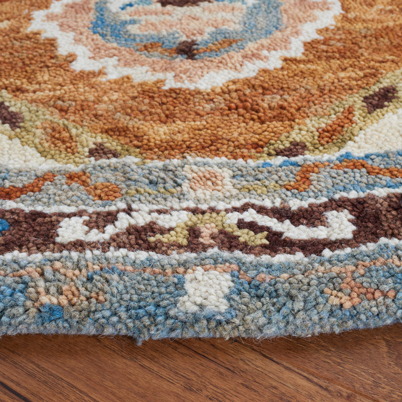 Arkadijus Southwestern Handmade Tufted Area Rug in Brown / Blue, Round 5'