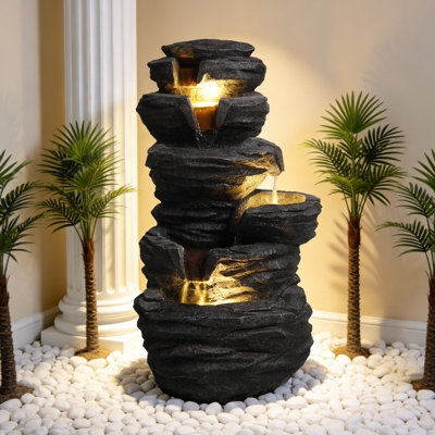 Stacked Stone Waterfall Fountain with Warm LED Glow
