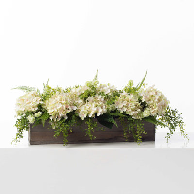 Arrangement floral floral vert dans un pot à fleurs Woodland