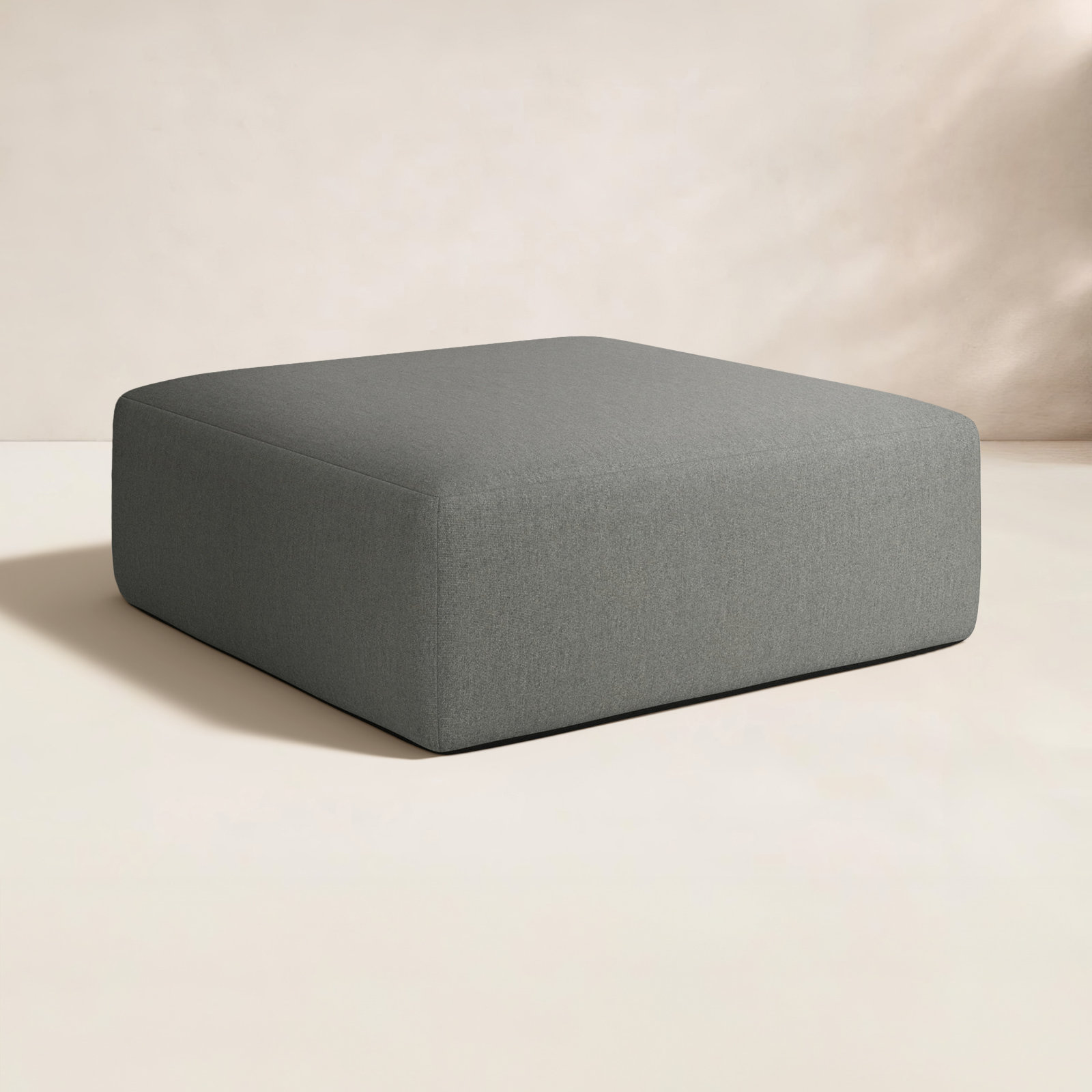 Hania Upholstered Outdoor Ottoman with Sunbrella® Cushion