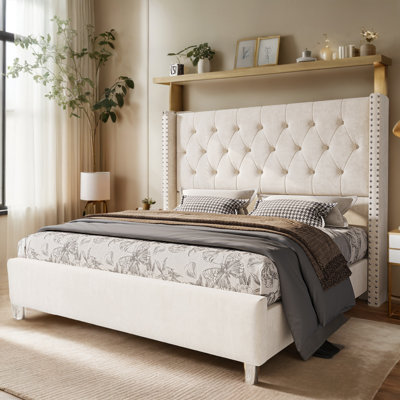 Ariste Upholstered Wingback Bed