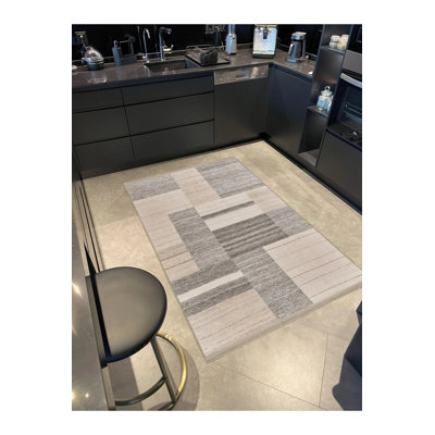Tapis décoratif moderne à motif géométrique à franges gris