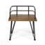 Ensemble de 2 chaises Zion Industrial en bois d'acacia et en métal, parfaites pour les terrasses et les cours extérieures rustiques.