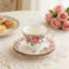 Service à thé en porcelaine tendre 15 pièces avec peinture florale élégante, comprenant théière, tasses, soucoupes, sucrier, pot à crème et cuillères pour le thé ou le café