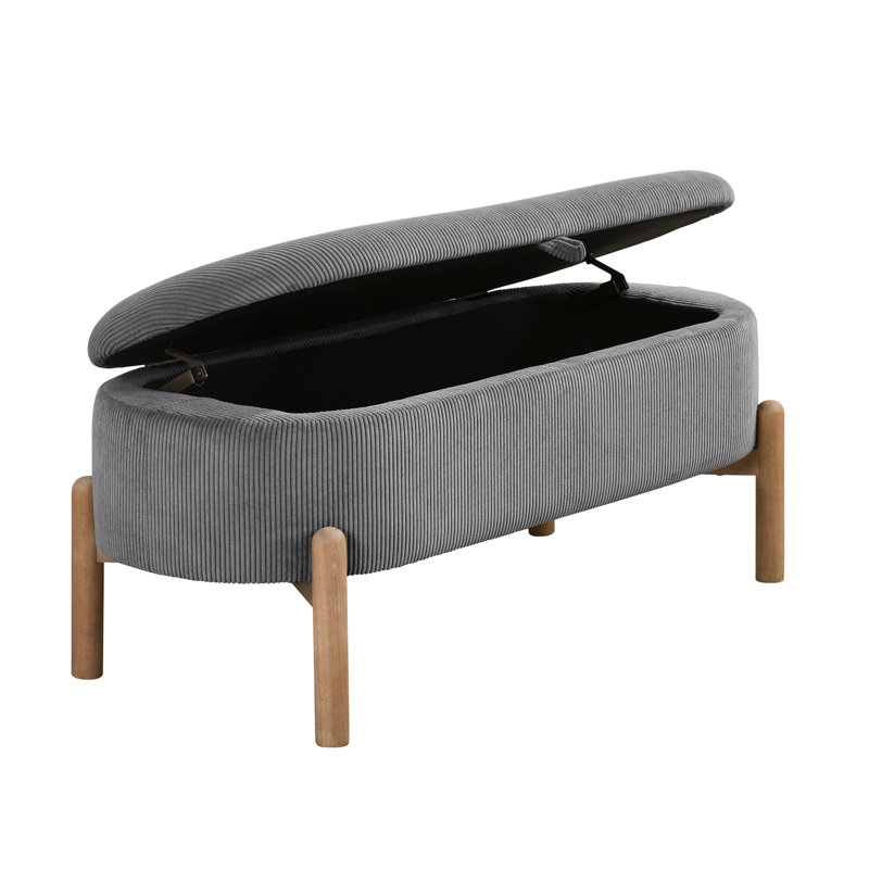 Banc de rangement élégant en velours côtelé gris avec des pieds en bois massif et une base polyvalente d'inspiration Mid-Century