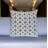 18" Beige and Blue Geometric Cotton Throw Pillow