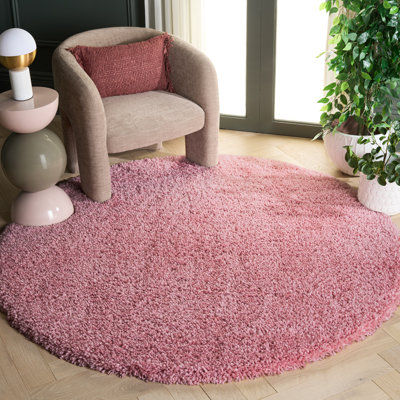 Tapis rose touffeté à la main Slusser