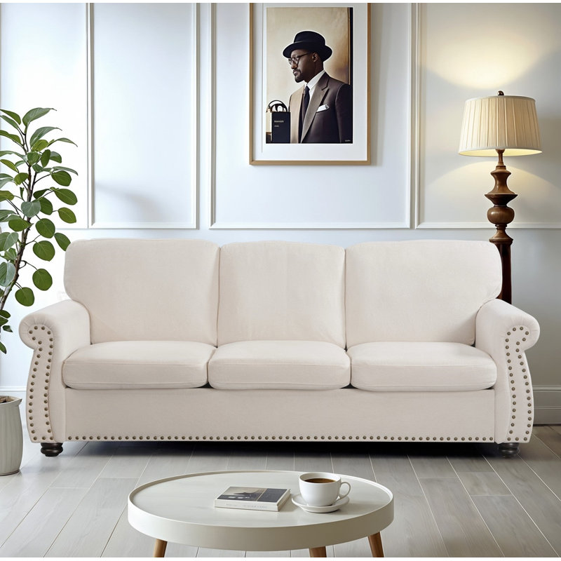 Rolled arm nailhead trim upholsterd Sofa, Ivory