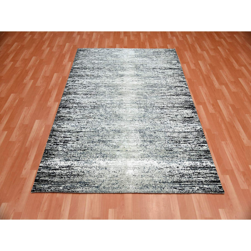 Tapis noir en laine nouvel âge 6 pi x 9 pi Poisson unique