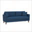 Canapé contemporain en tissu bleu avec coussins moelleux et détails capitonnés pour un salon élégant