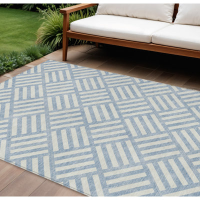 Tapis extérieur lavable géométrique 9 pi x 12 pi bleu ciel et ivoire