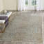 Banerjee Animal Print Area Rug in Stone/Aqua-778425403